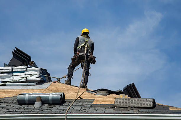 Professional Gutter Installation technician working in Royalston, MA